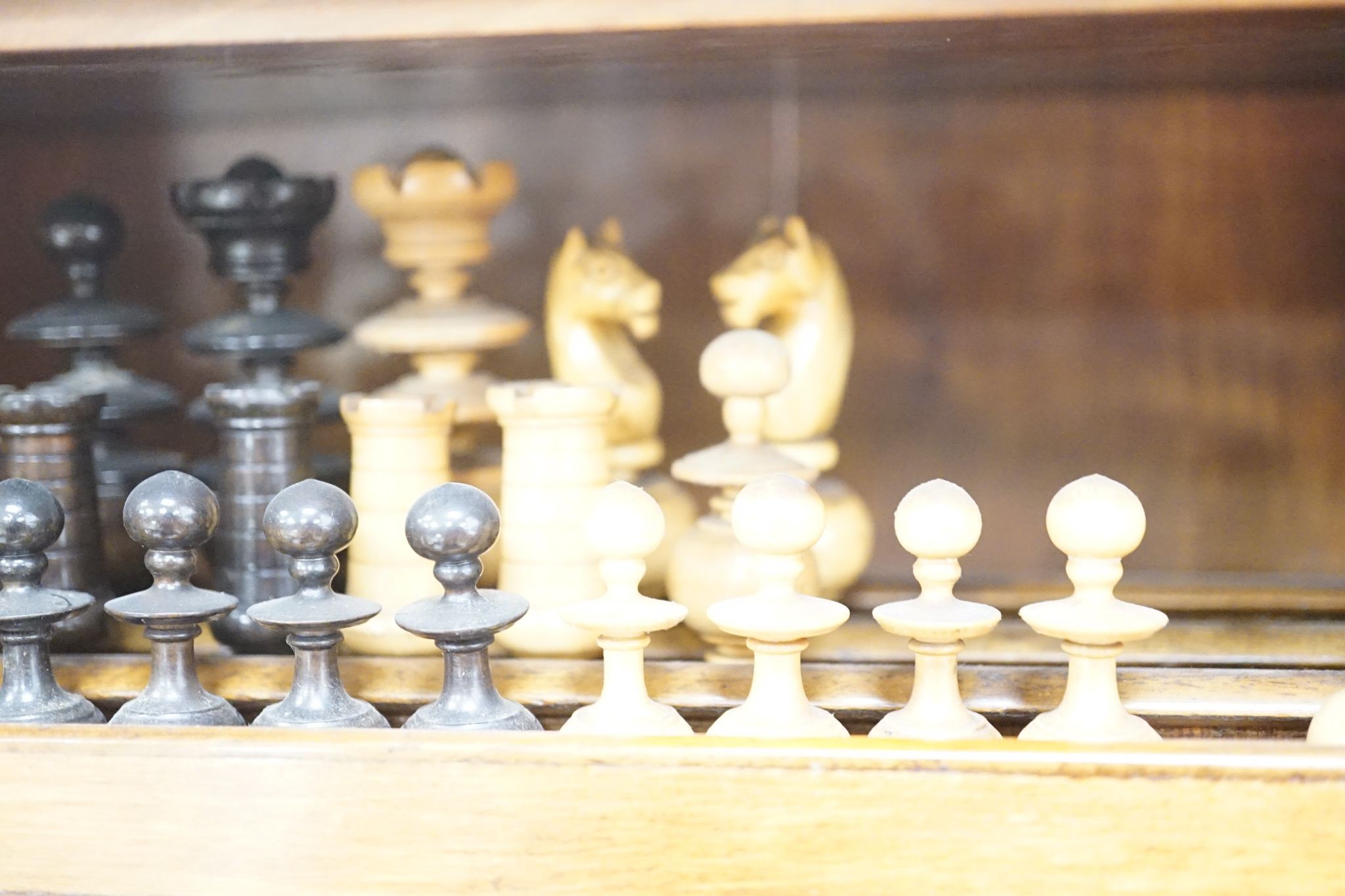 A late 19th century gilt metal mounted walnut games cabinet, W.40cm D.19cm H.49cm